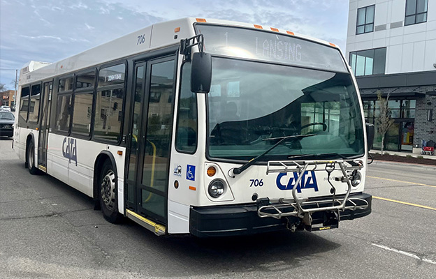 A CATA large bus driving on the road