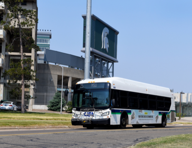 MSU bus driving by Spartan Stadium
