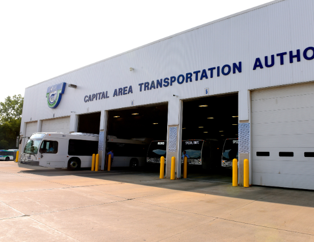 Busses leaving the garage from CATA's Admin Building